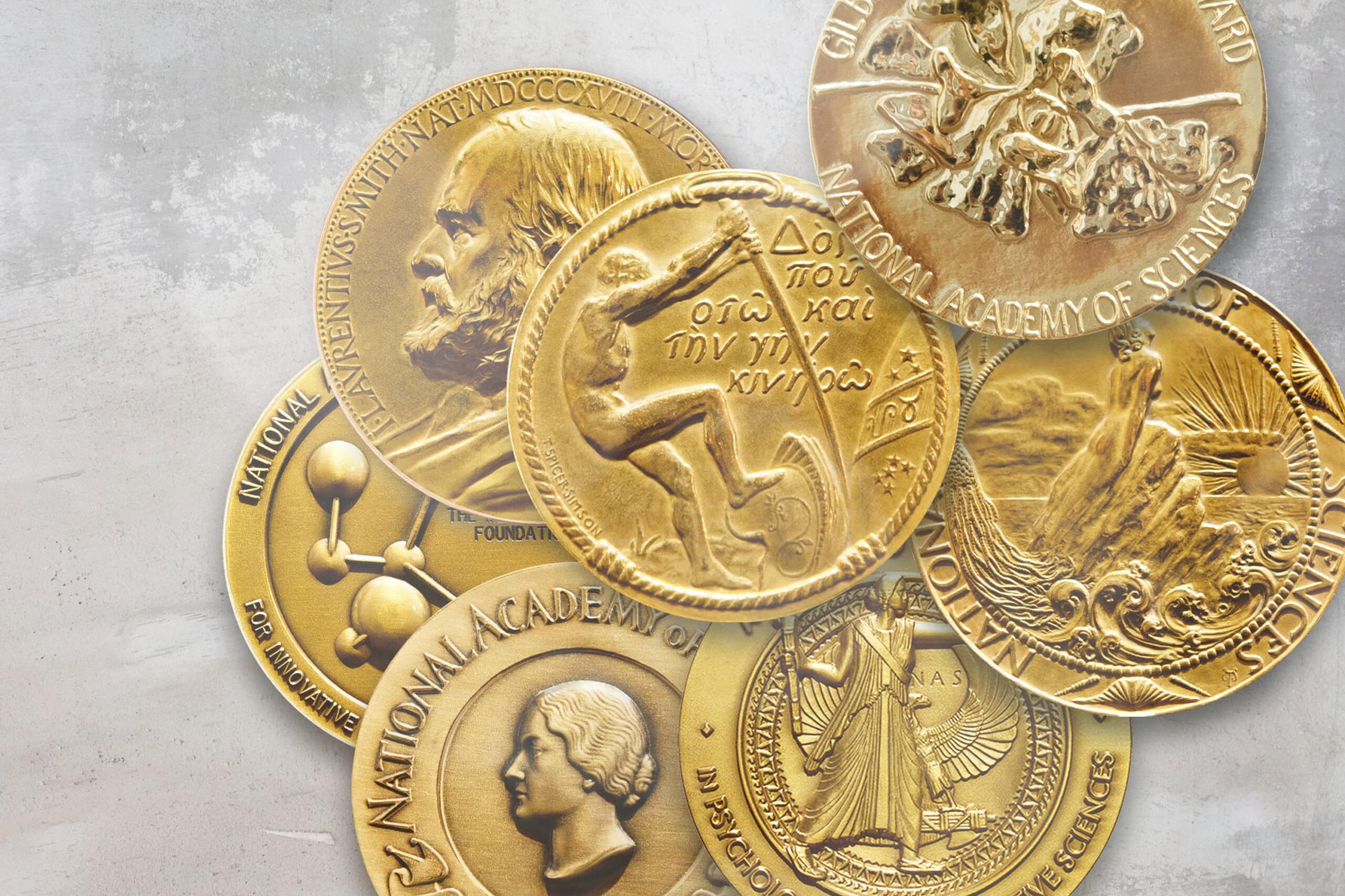 Various gold coins featuring unique designs and images.