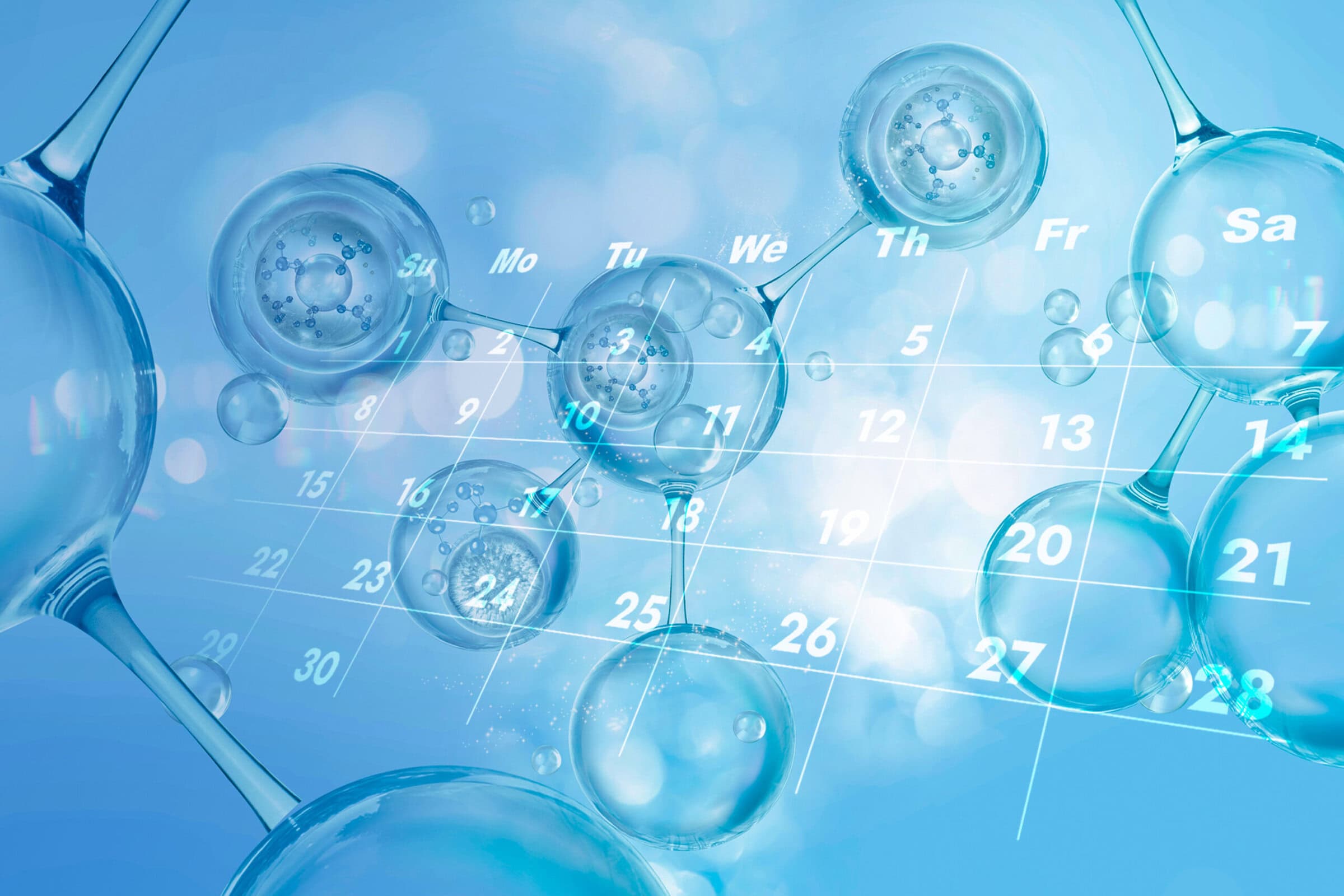 A calendar with blue bubbles and a pen, representing scheduling and planning.