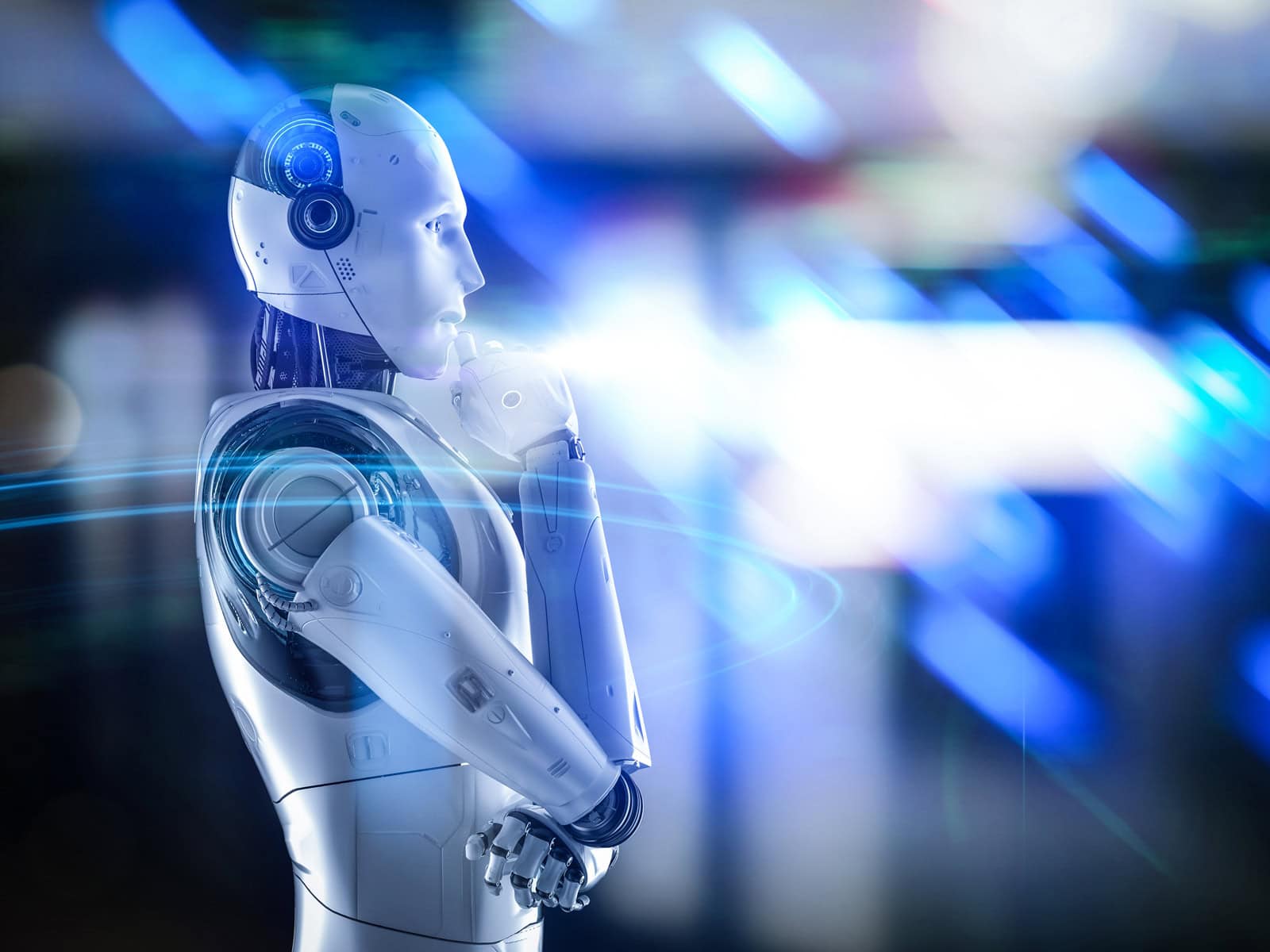 A robot standing in front of a blurred background.