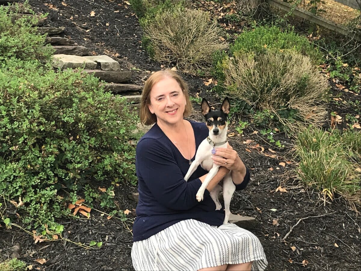 2024 National Dog Day, Dr. Ostrander and dog.